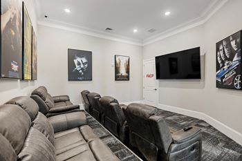 a living room with couches and a tv at Ellis Station, Durham, North Carolina